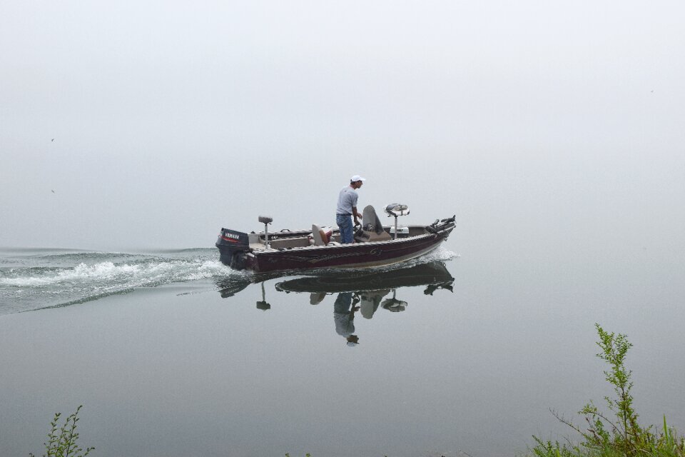 Fog fisherman boat photo