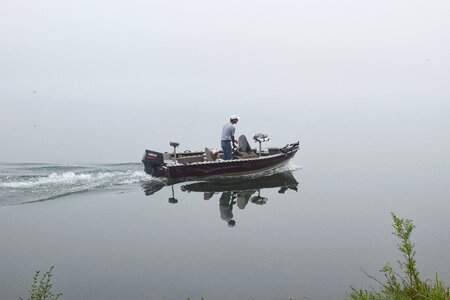 Fog fisherman boat