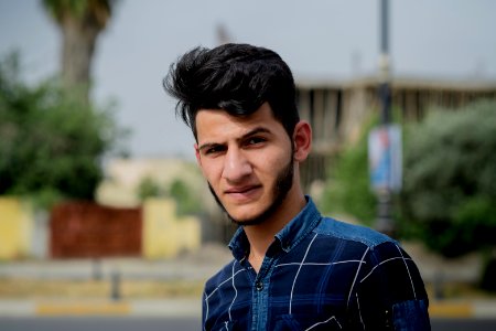 A young Moslawi gentleman poses for a portrait in summer of 2019 in Mosul 03