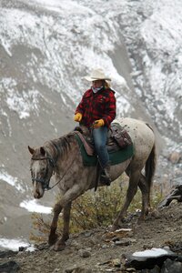 Mountain riding horseback photo