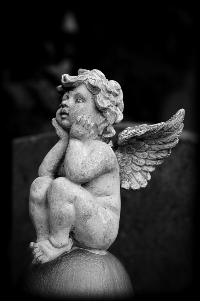 Figurine cemetery stone statue