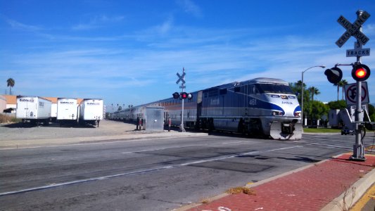 Amtrak train passing on BNSF tracks in Santa Fe Springs CA