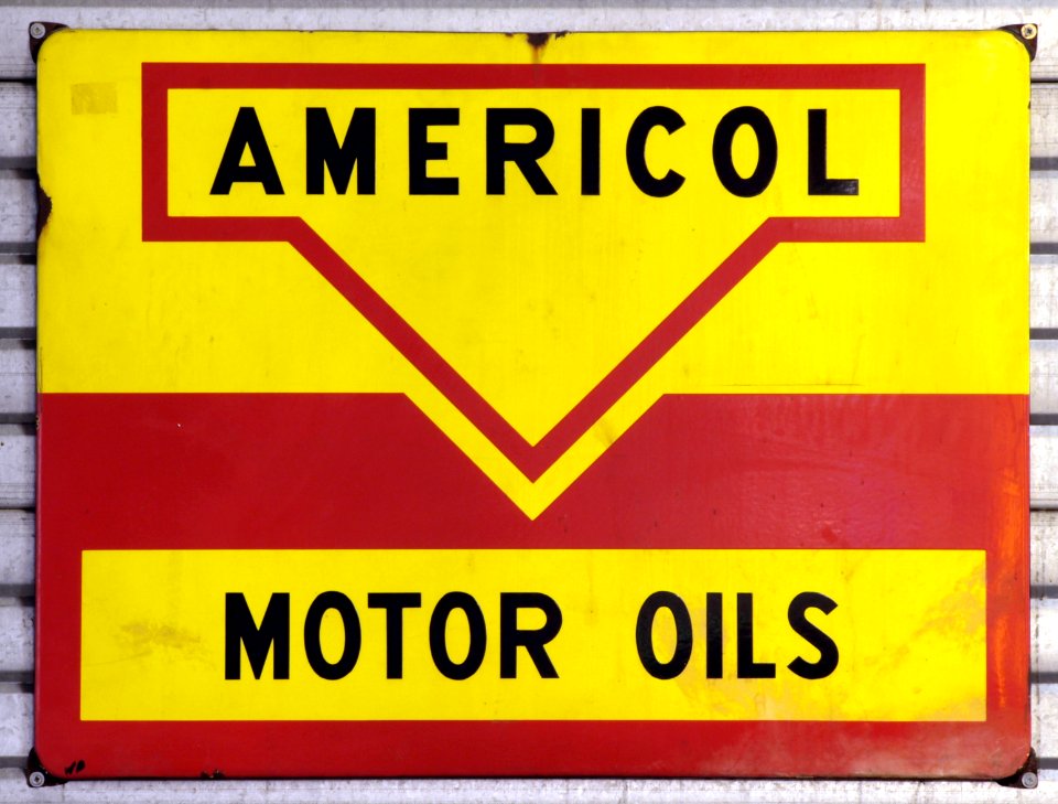 Americol Motor Oils, enamel advert sign at the den hartog ford museum pic-123