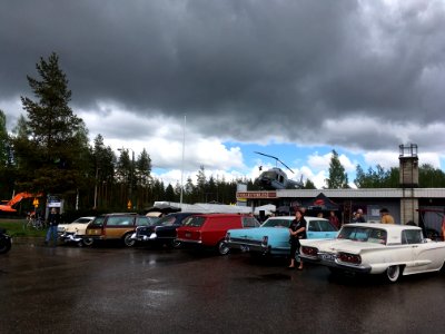 American-made cars outside Weird Antiques in Tuusula
