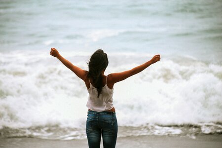 Person sand sea