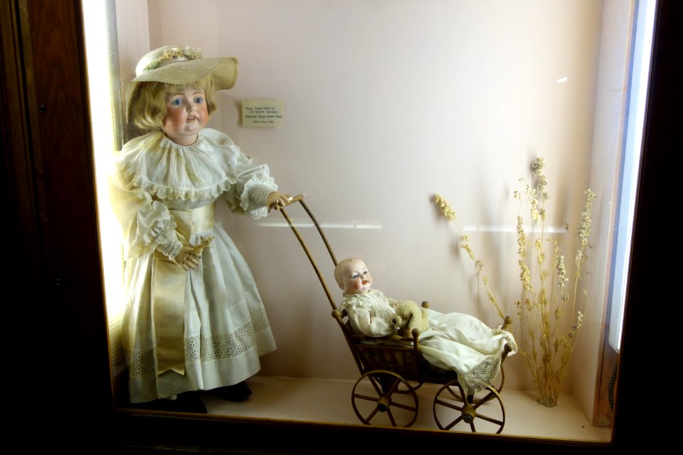 Anna by J. D. Kestner, Germany, and baby doll, bisque heads circa 1900 - Fairbanks Museum and Planetarium - DSC04293