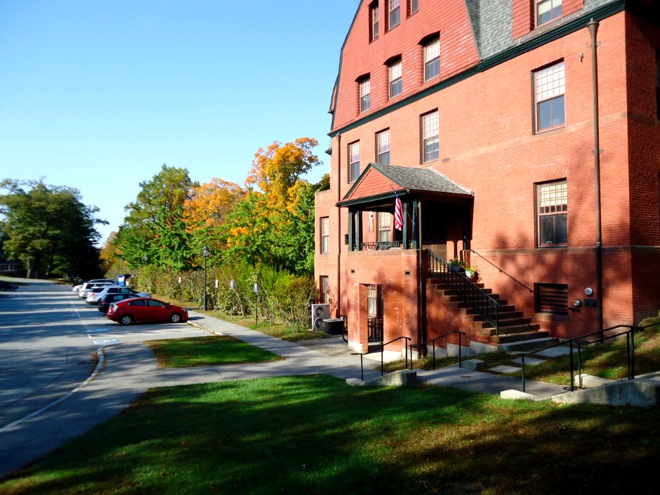 Andover Massachusetts Phillips Academy Abbot campus Draper Hall side view with parking lot