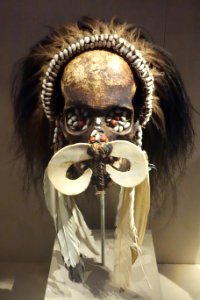 Ancestor skull, Southwest Coast, Asmat people, 20th century, human skull, shell, feather, seed, fiber - De Young Museum - DSC01206