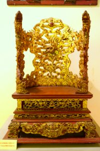 Altar in the shape of a chair, Nguyen dynasty, 19th to early 20th century, crimson and gilded wood, view 1 - National Museum of Vietnamese History - Hanoi, Vietnam - DSC05625 photo
