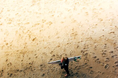 Beach sand footprints photo