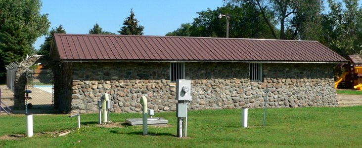 Alpena, SD, swimming pool bathhouse from SSW 1