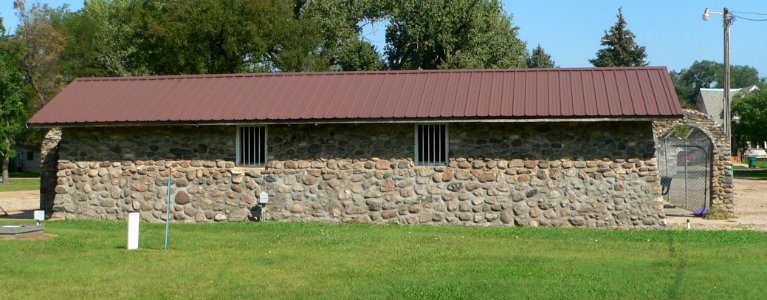 Alpena, SD, swimming pool bathhouse from S 1