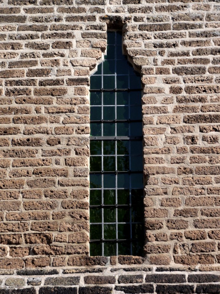 Alphen (Gld) Rijksmonument 8198 raam in toren H. Lambertuskerk