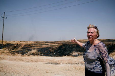 At the scene of a massacre against Ezidis committed by the Islamic State on the road to Hardan 10