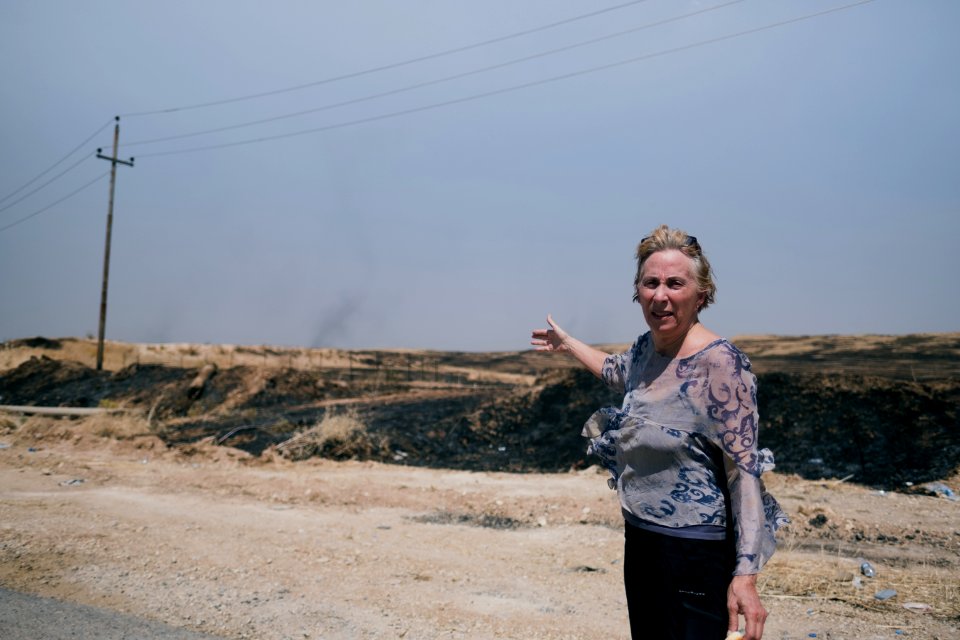 At the scene of a massacre against Ezidis committed by the Islamic State on the road to Hardan 11