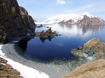 Rocks spring snow photo