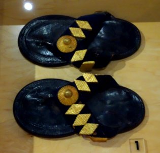 Asante ruler's sandals, gold ornaments, Ghana, 20th century - Bata Shoe Museum - DSC00047