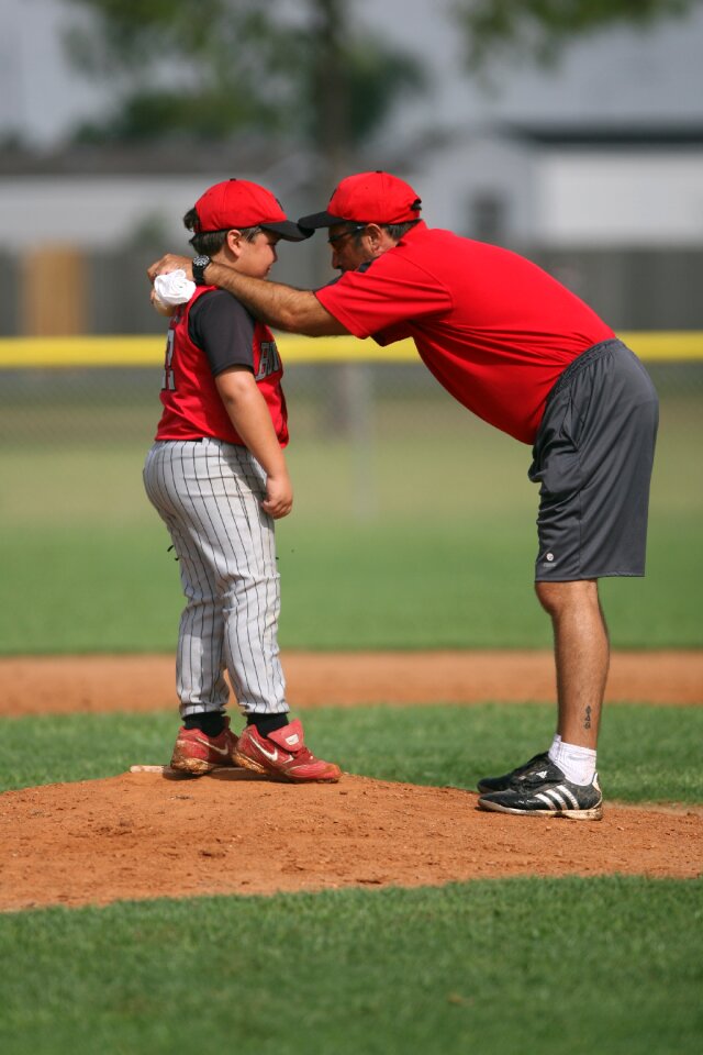 Pitching mound coach conference photo