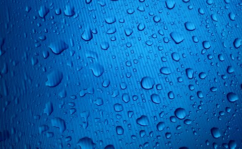 Raindrops water drops blue rain photo