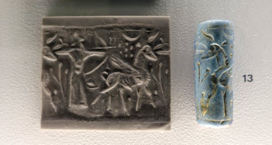Archer shooting winged bull, cylinder seal, Neo-Assyrian, c. 883-612 BC, frit - Sackler Museum - Harvard University - DSC01725