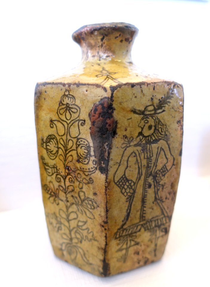 Aquavit bottle with engraved decorations of floral ornament and a dandy, Vasterfarnebo, Vastmanland, ceramic - Nordiska museet - Stockholm, Sweden - DSC00032