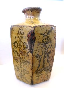 Aquavit bottle with engraved decorations of floral ornament and a dandy, Vasterfarnebo, Vastmanland, ceramic - Nordiska museet - Stockholm, Sweden - DSC00032