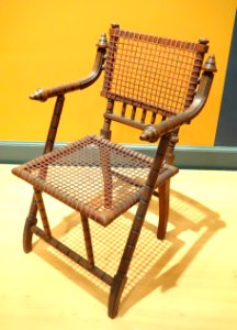 Armchair, George Hunzinger, New York, patented March 30, 1869 and April 18, 1876, walnut and textile-covered steel wire - Brooklyn Museum - DSC09626