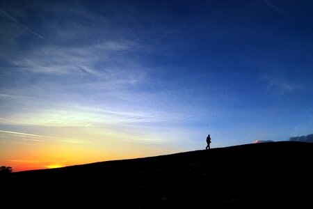 Outcropping alone walking uphill