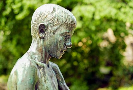 Boy mourning park