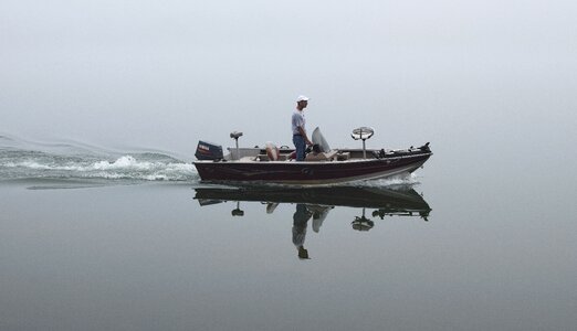 Fog fisherman boat photo