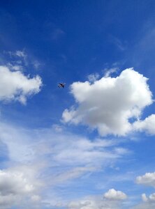 Clouds sky blue airplane