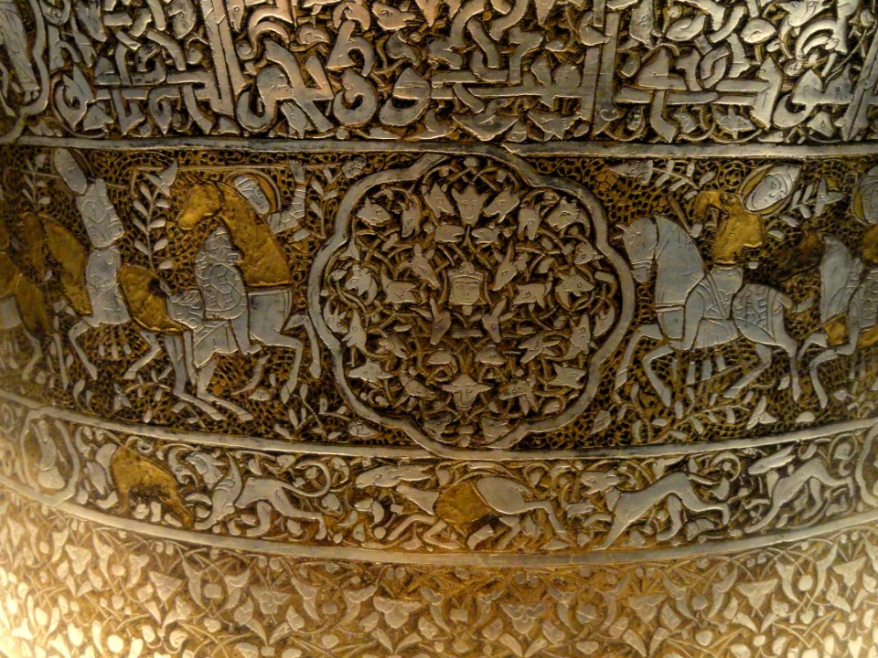 Basin with Christian and Islamic motifs, probably northern Iraq, mid 13th century AD, brass inlaid with silver, view 2 - Freer Gallery of Art - DSC05382