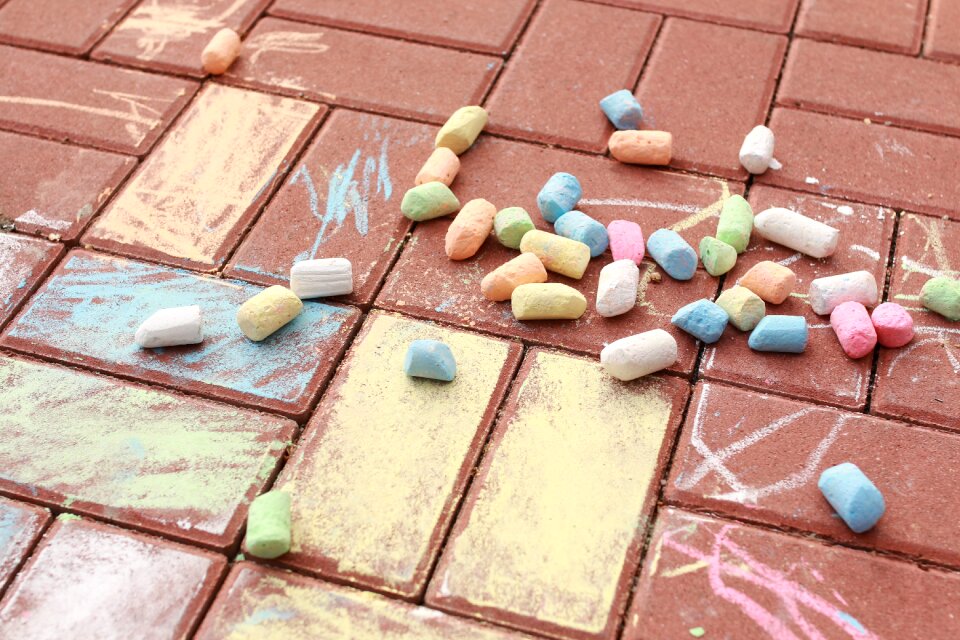 A child's drawing pavement chalk