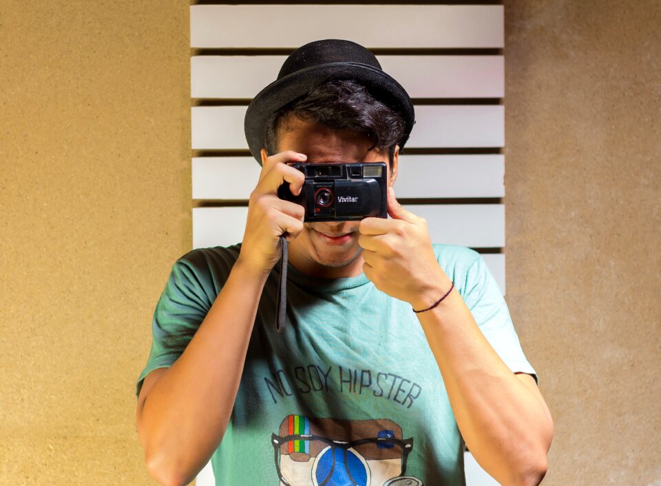 Analog camera young man