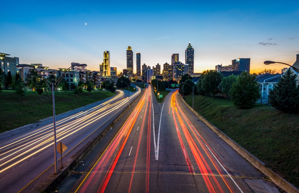 Highway light streaks roads photo