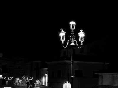 Street lamp people lights and shadows photo