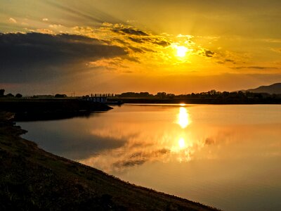 Pond twilight sun