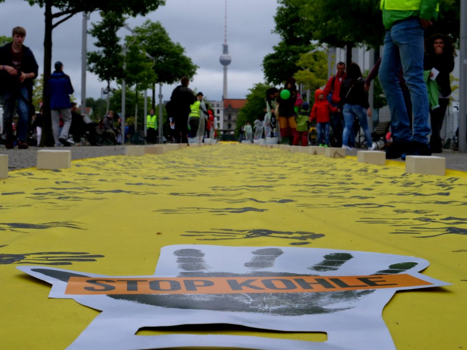 Banner with hands against coal 03