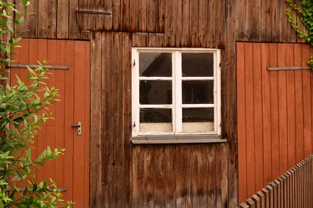 Log cabin timber façade window photo