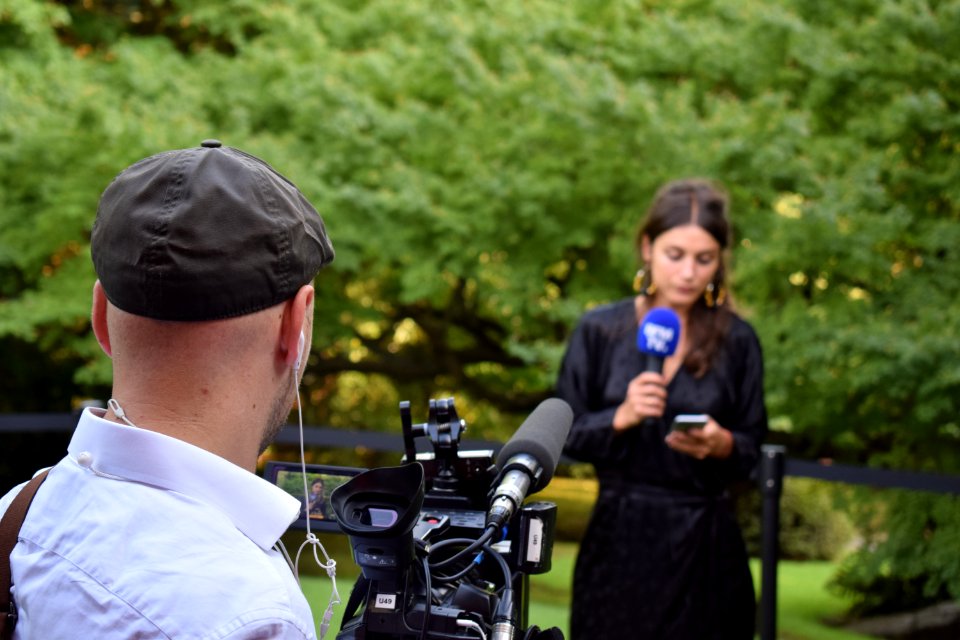 BFM TV journalist after Macron speech in Tokyo 01