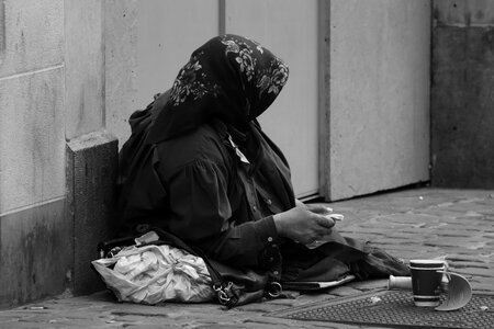 Alms beggar old woman