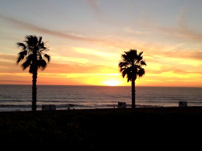 Sunset ocean beach photo