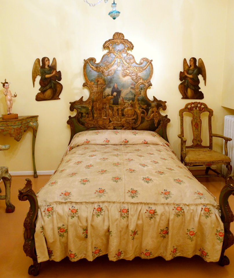 Bed with painting of St Augustine, mid 18th century, painted and gilded stucco and pine - Museo Nacional de Artes Decorativas - Madrid, Spain - DSC08291