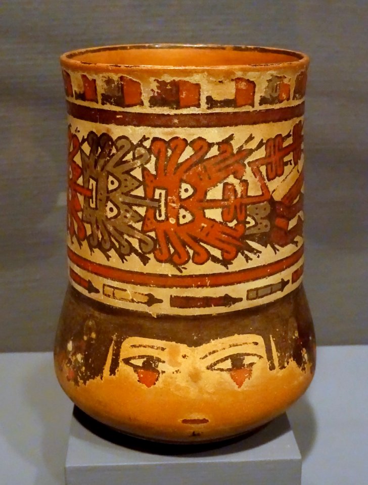 Beaker with female face and trophy heads, Peru, Late Nasca, c. 500 AD, earthenware with slip glaze - Krannert Art Museum, UIUC - DSC06487