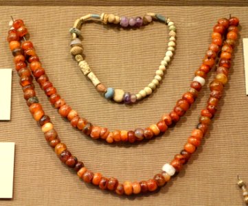 Beads, (above) Nippur, Area TA, Neo-Assyrian period, 900-612 BC, frit, bone, amethyst, agate, (below), Syria, carnelian, rock crystal - Oriental Institute Museum, University of Chicago - DSC07312