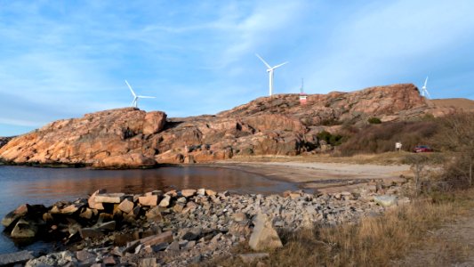 Beach and lighthouse in Fiskebäcksvik photo