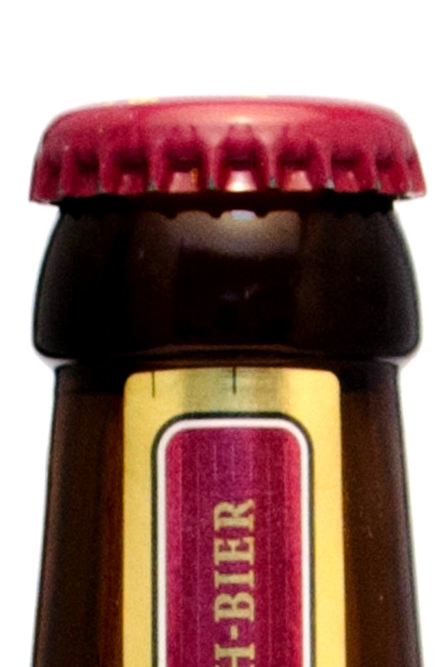 Beer bottle closed with crown cap, unopened