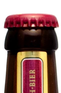 Beer bottle closed with crown cap, unopened