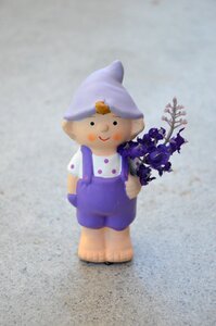 Overalls flowers in the hand dwarf
