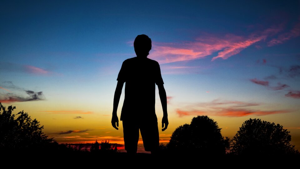 Human sunset shadow play photo